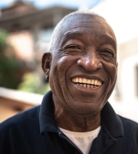 Photograph of a man smiling.